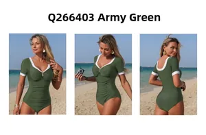 Détail du maillot de bain vert armée à manches courtes avec bordures blanches contrastées