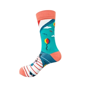Detail of cotton crew socks featuring hot air balloon, seagulls, and nautical summer patterns