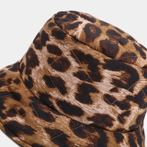 Detailed close-up of leopard print quilted bucket hat with fine stitching textures
