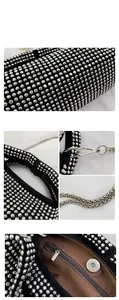 Close-up of sparkling silver rhinestones, metal chain and magnetic clasp on evening bag