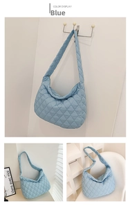 Detailed views of light blue quilted hobo bag featuring soft nylon and large capacity