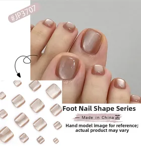 Detail of JP3707 brown cat-eye press-on toenails with shimmering finish and pearl texture