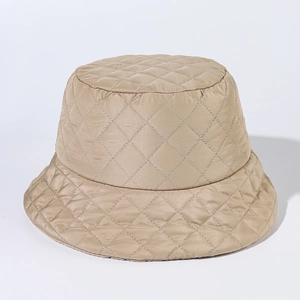 Detail of khaki quilted bucket hat showing diamond stitching and insulated fabric texture