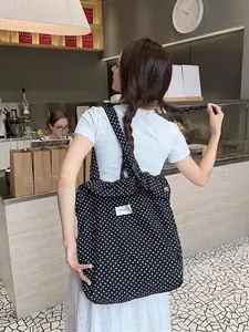 Polka dot canvas tote bag for women with large capacity and white label detail