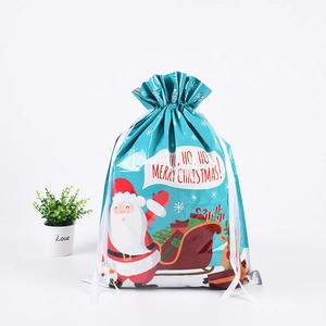 Blaue Weihnachts-Geschenktüte aus Folie mit Tunnelzug und Cartoon-Weihnachtsmann-Motiv