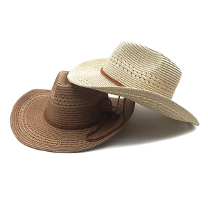 Vintage western straw cowboy hats in brown and beige with hollow weave and rope trim