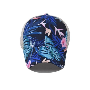 Navy baseball cap with tropical floral print and white mesh back for ponytails
