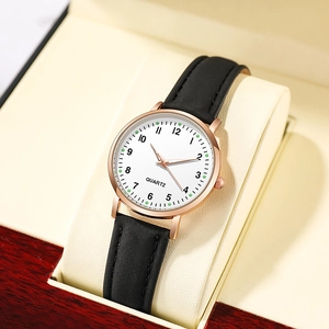 Luminous quartz watch with rose gold case and black leather strap in a premium wooden box
