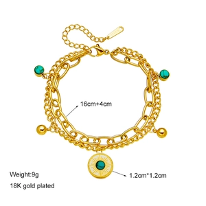 Double-layered 18K gold plated steel bracelet featuring a turquoise bead and sunburst coin