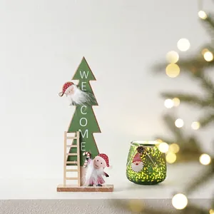 Wooden Christmas tree tabletop decor with Welcome sign and Santa Claus figurines