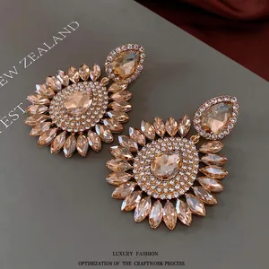 Boucles d'oreilles pendantes tournesol en cristal champagne avec pierres en goutte