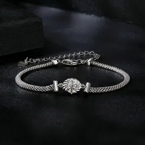 Elegant S925 sterling silver woven bracelet with moissanite and heart charm detail