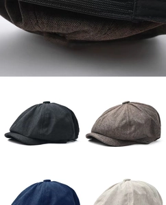 Detail of adjustable velcro strap and textured fabric on linen newsboy caps in multi colors