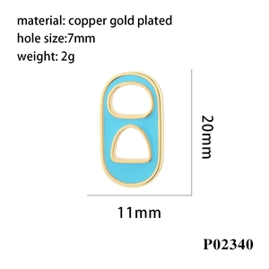 Macro view of light blue enamel soda tab charm with copper gold plated finish details