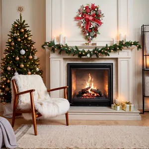 Christmas teardrop swag with red bows and berries hanging on a white fireplace mantle