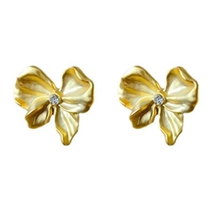 Golden ribbon bow stud earrings with sparkling zirconia centerpiece on white background