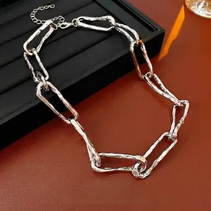 Silver textured chunky link chain necklace with irregular wrinkled finish and lobster clasp