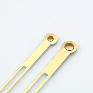 Brushed gold metal clock hands with precise mounting holes for wall clock movements