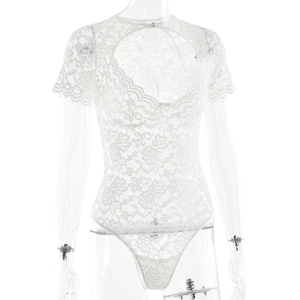 Close-up of white lace short-sleeve bodysuit featuring intricate hollow-out details