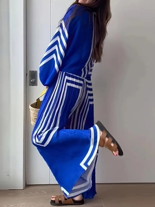 Blue and white striped pleated two-piece set with long sleeve shirt and wide leg trousers