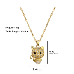 Macro detail of cat pendant with white crystals, dimensions 2.5cm x 1.6cm, 4.9g weight