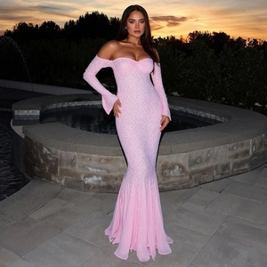 Detailed view of pink lace long sleeve tube top evening gown with mermaid tail design