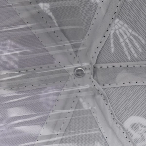 Macro view of skeleton hand pattern on breathable mesh lining inside the baseball cap