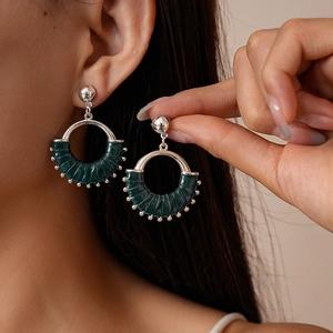 Retro dark green leather pleated fan earrings with silver geometric metal rings for women