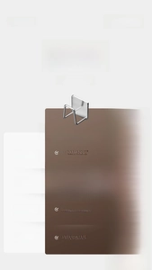 Close-up of stainless steel wall hook with thick base plate and smooth rounded edges