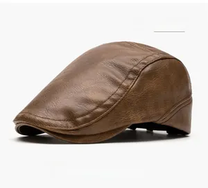 Close-up of coffee brown leather flat cap showing detailed lychee grain and stitching