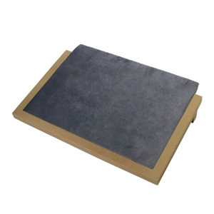 Gray velvet jewelry tray with gold frame for necklace and pendant display on white background
