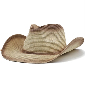 Detail of western straw cowboy hat featuring gradient weave and bull head ornament