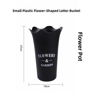 Detail of 27cm black plastic flower bucket with wavy rim and Garden lettering