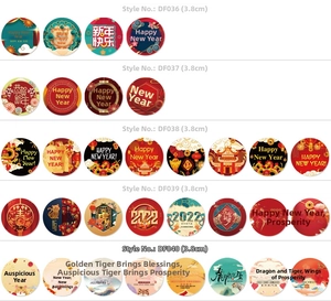 Detail view of round 3.8cm Chinese New Year stickers with lanterns and dragon motifs