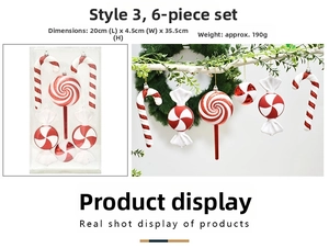 Detailed view of 6-piece red and white Christmas candy ornaments with glitter hanging on tree