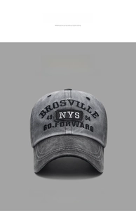 Close-up of vintage washed cotton baseball cap featuring high-quality BROSVILLE embroidery