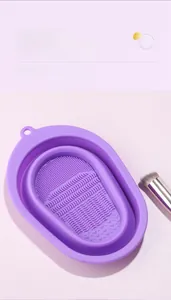 Detailed macro view of purple silicone makeup brush cleaning bowl with textured surfaces