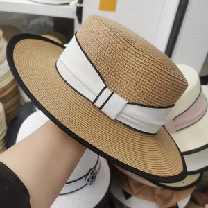 French retro flat top straw sun hat with white ribbon and black trim for women
