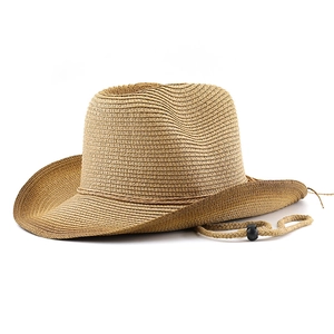 Detail of light brown straw cowboy hat featuring woven texture and adjustable chin strap