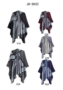 Flat lay of open-front shawls in five colors with geometric and floral patterns