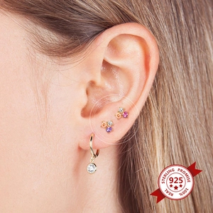 S925 sterling silver gold earrings set with colorful cubic zirconia stones on ear