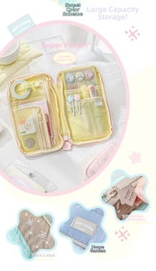 Detail view of multi-compartment yellow stationery pouch with star embroidery and zippers