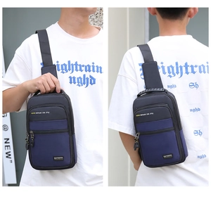 Close-up of waterproof Oxford waist bag showing contrast colors and durable top handle