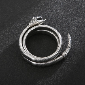 Polished stainless steel snake bracelet with textured scales and flexible triple layer design