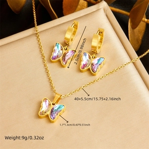 Golden butterfly jewelry set with gradient crystals including necklace and earrings