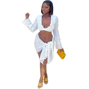 Detail view of the white waffle textured fabric on the sexy two-piece beach set