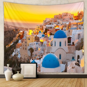 Detail view of Santorini sunset tapestry with blue dome churches on a modern wall