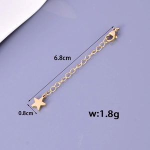 Detail of golden stainless steel extender chain with lobster clasp and 0.8cm star pendant