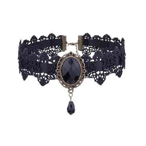 Detail of gothic black lace arm chain with oval gemstone and teardrop pendant