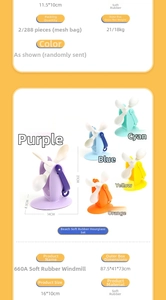 Detail of colorful soft rubber beach hourglass toy set with rotating windmill for kids